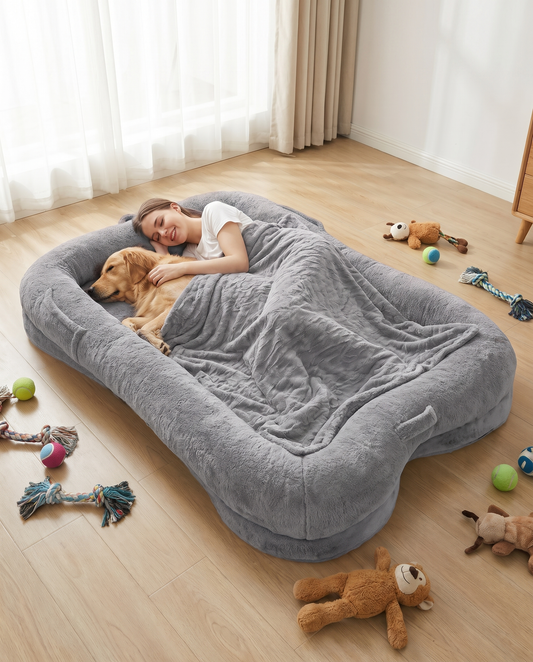 Large plush gray bolster bed designed for adults and dogs to cuddle together
