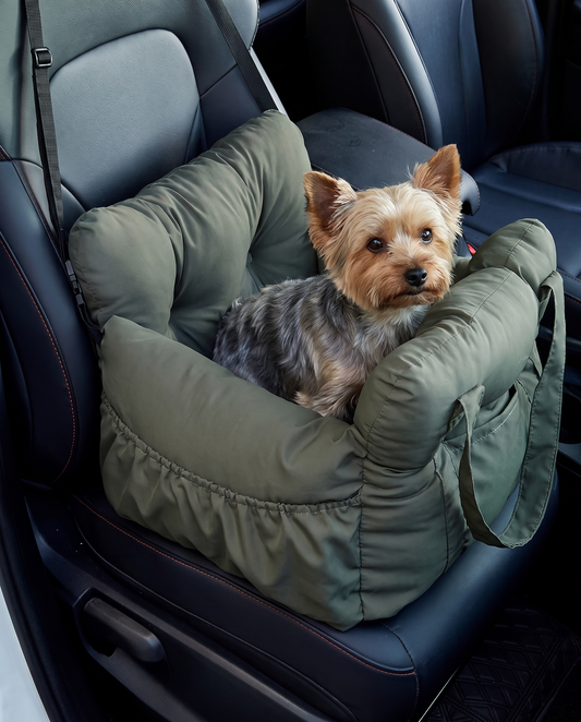 Light gray portable travel dog car booster bed with plush cushion and side carry straps.